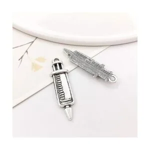 Antiguo tono plata Medico encantos jeringa estetoscopio