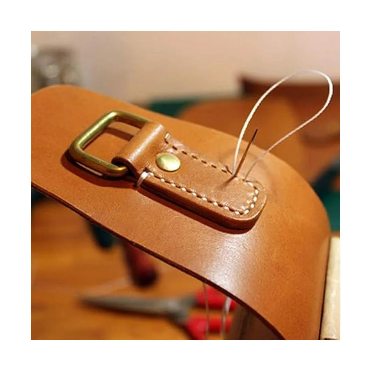 Hilo de lino encerado y punzón de mango de madera agujas