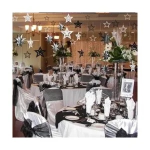 Guirnalda de estrellas con purpurina en color negro y gris