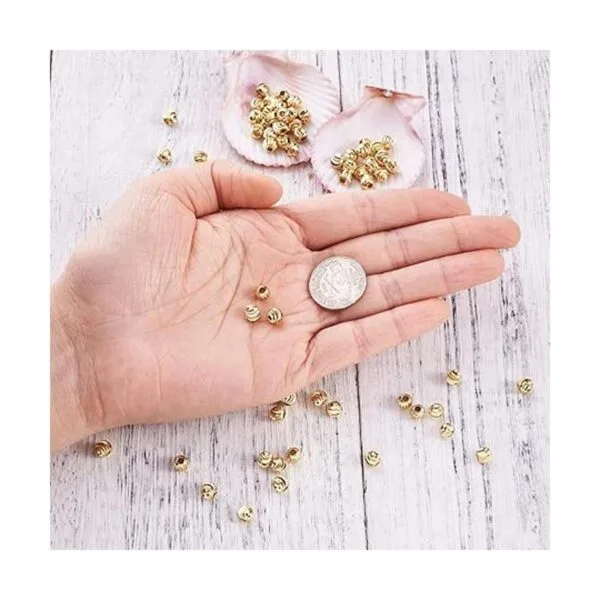 Craftdady 100 cuentas redondas chapadas en oro de 18_5