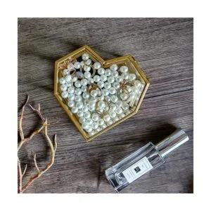 Caja de joyería de cristal dorado con forma de corazón