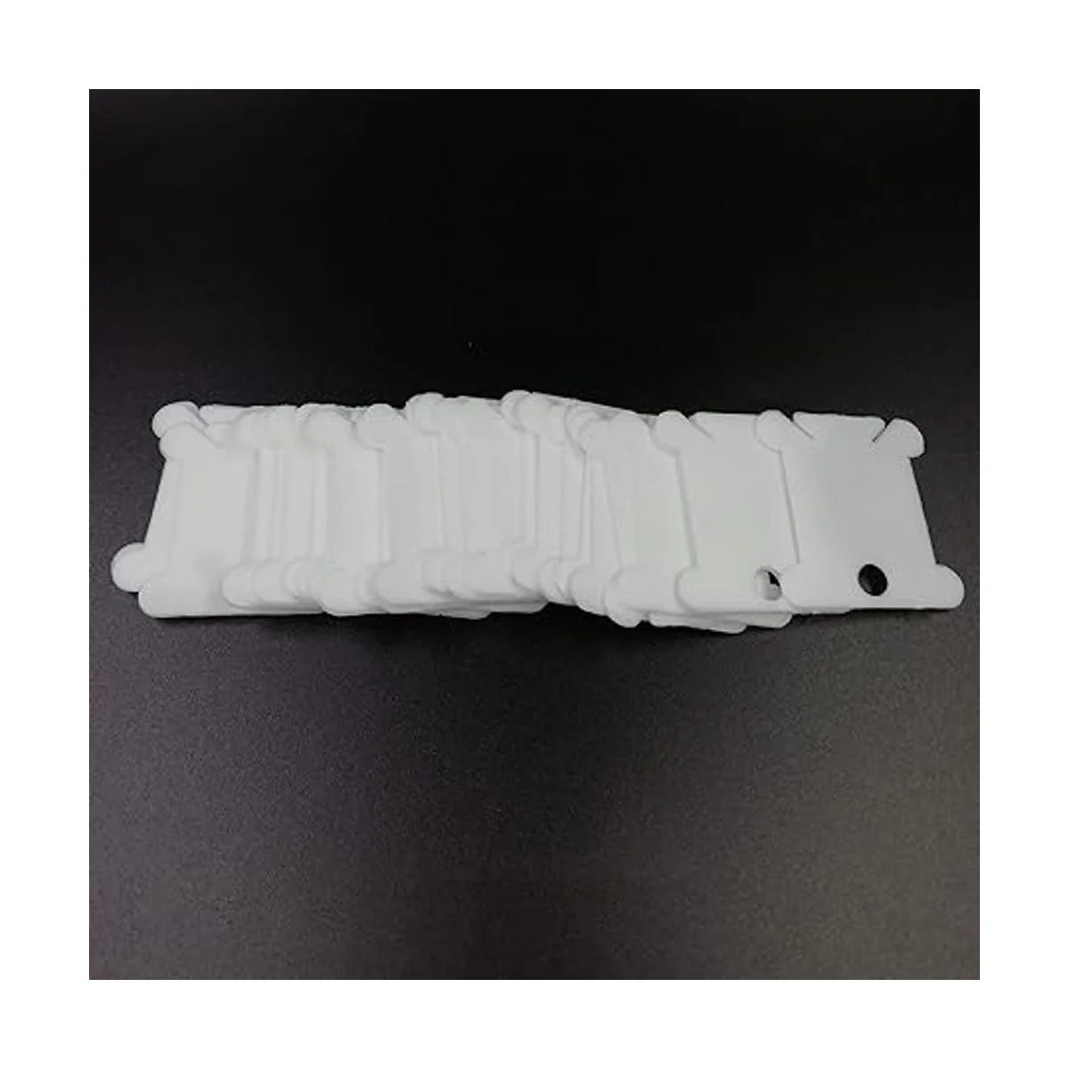 300 bobinas de hilo dental de plástico para cruz de hilo