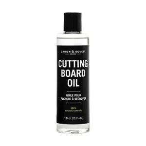 Caron Doucet Tabla de cortar y aceite de_1