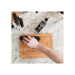 Caron Doucet Tabla de cortar y aceite de_3