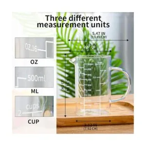 Taza medidora de vidrio mango aislado pico en forma de_4