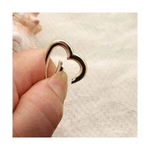 Sukpsy 8 piezas de corazón giratorio resorte cierres_2