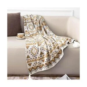 Manta bohemia de punto con borlas color marrón suave_4