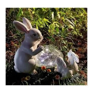 Familia de conejitos con energía solar para decoración de_7