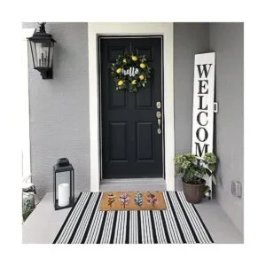 Alfombra de algodón a rayas blancas y negras de 27.5 x 43_5