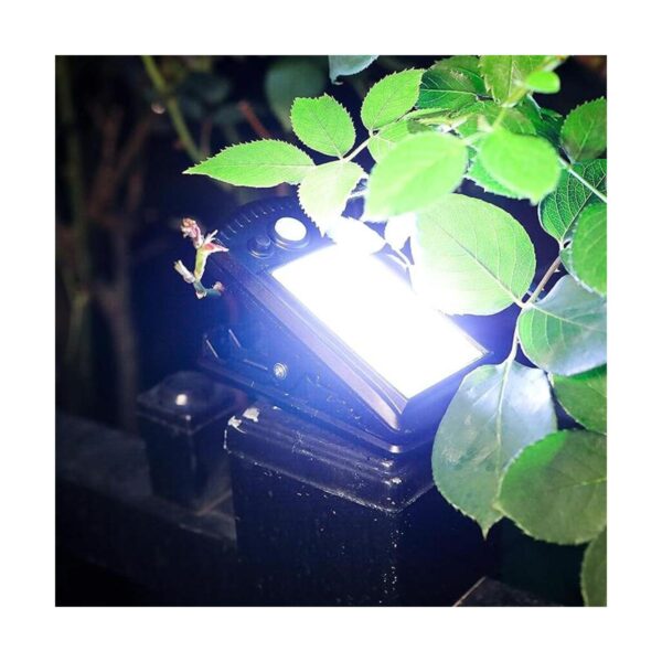 Paquete de 4 luces solares de seguridad con sensor de_5