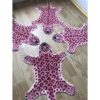 Alfombra de piel de vacuno con estampado de leopardo