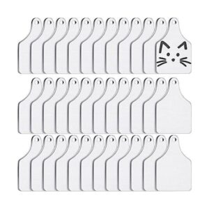 Etiquetas de metal de vaca en blanco con estampado de