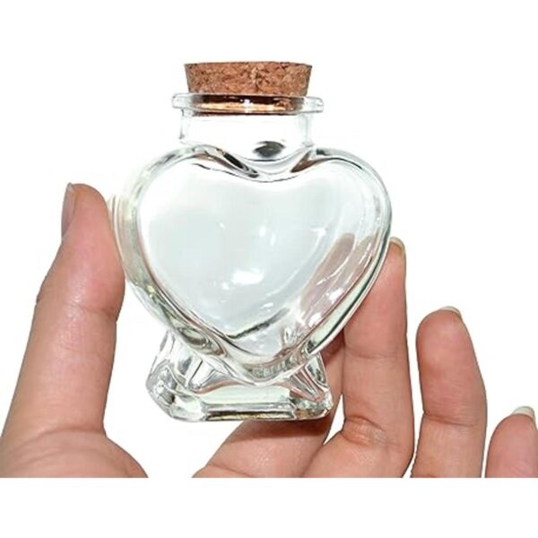 Botella de vidrio transparente con tapón de corcho