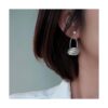 24 piezas de aretes con clip y componentes convertidores