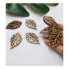 30 pendientes en blanco con corte de hoja de madera