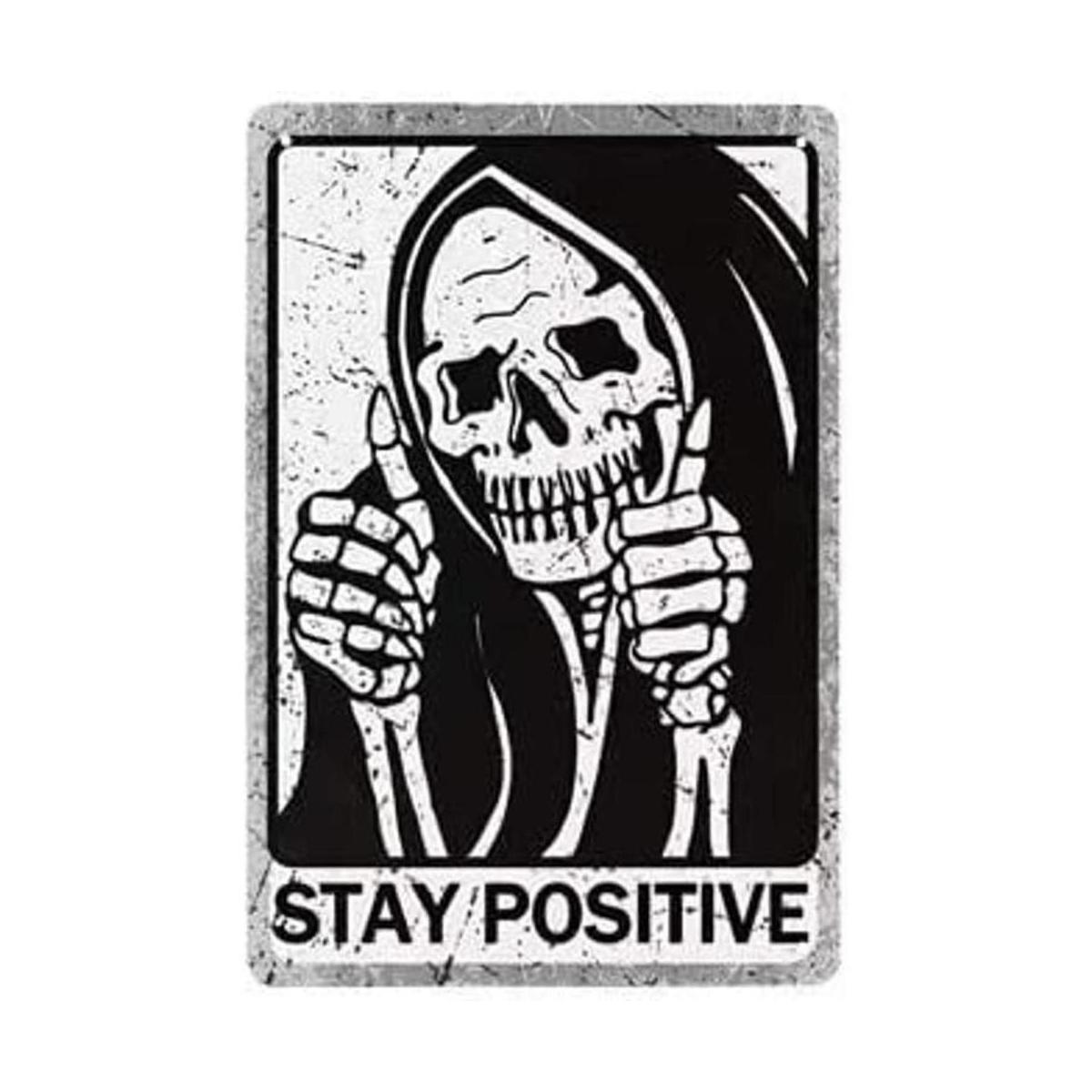 Mantente positivo letrero de lata de calavera divertido