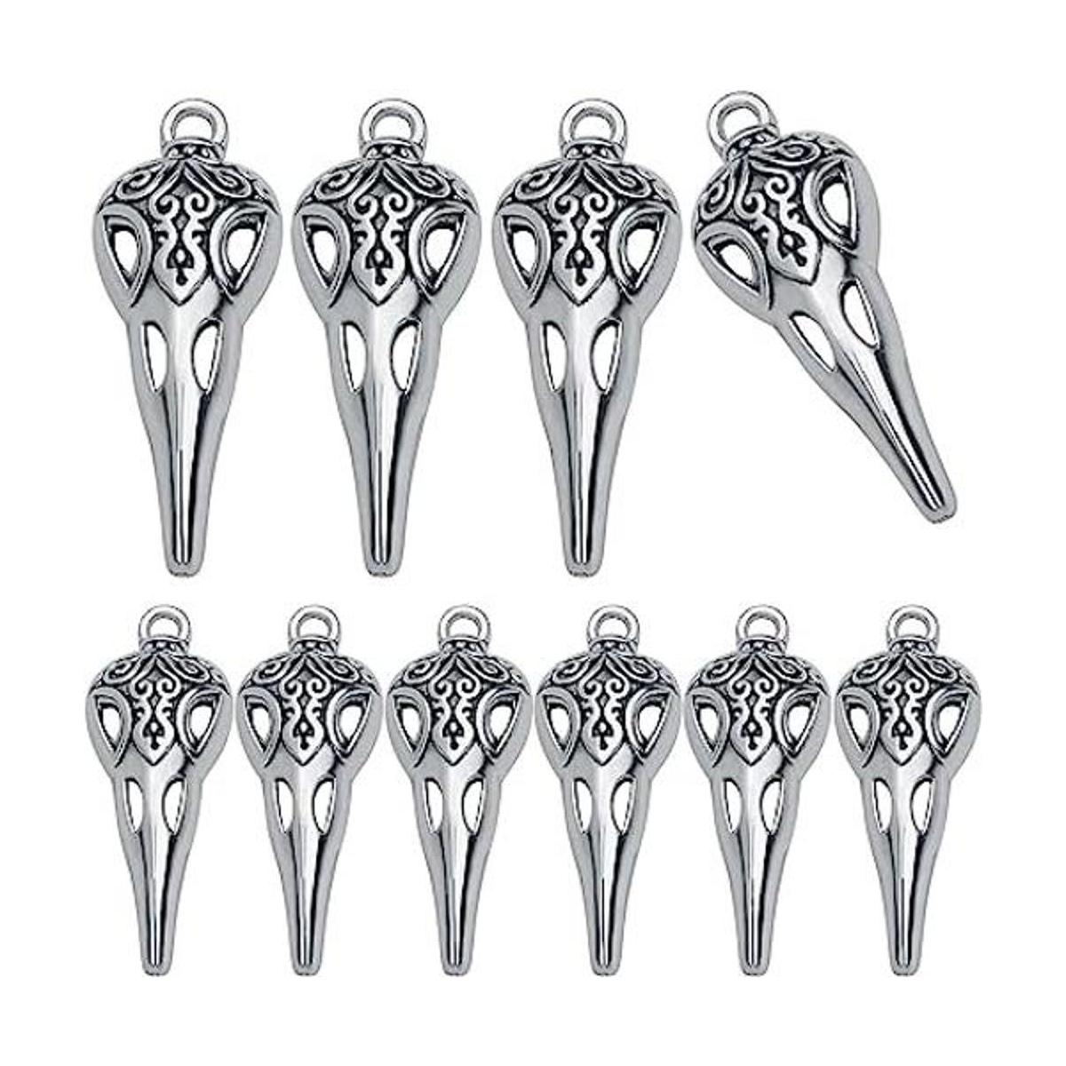50 dijes de cabeza de pájaro de calavera de plata antigua
