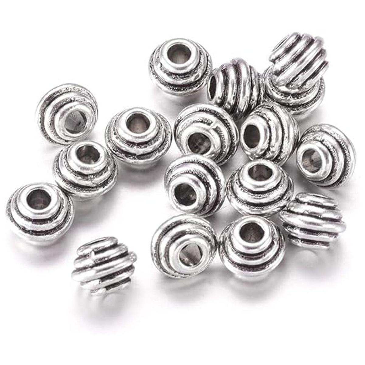 Craftdady 50 cuentas espaciadoras de bicono de plata