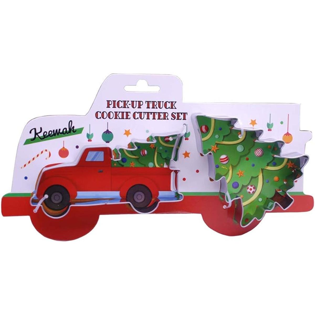 Camión grande con cortador de galletas para árbol de