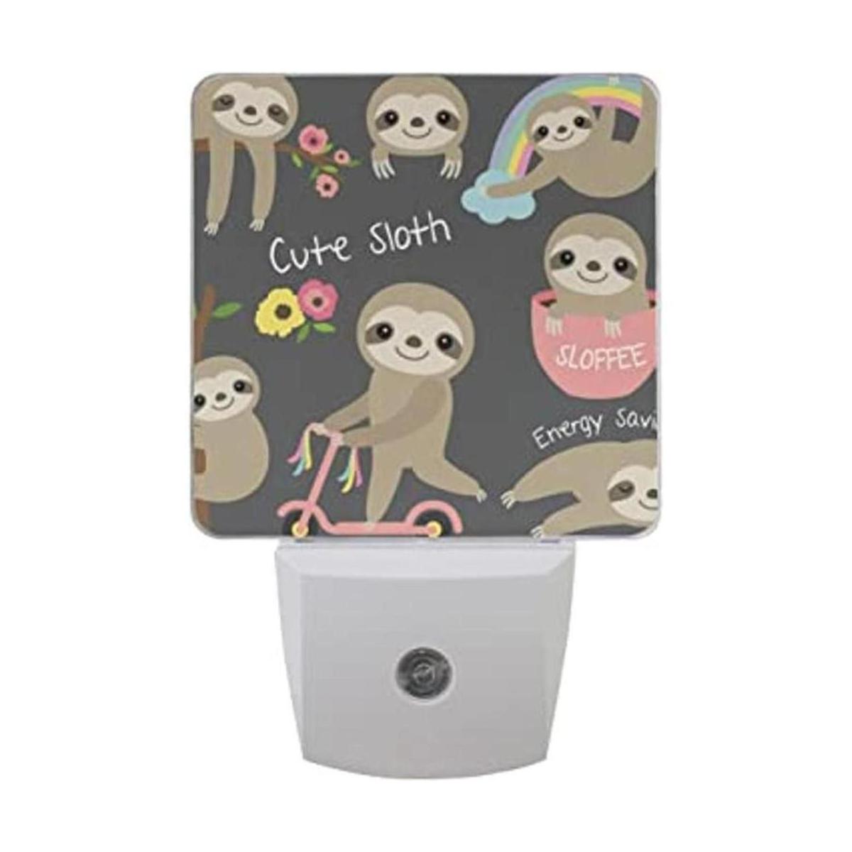 Lámpara de noche LED enchufable con sensor de luz lindo