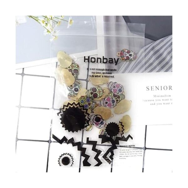 Honbay 24pcs esmalte aleación cráneo encantos colgantes