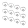 UNICRAFTALE 12 piezas de corazón con colgante de huella de