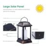 TomCare Paquete de 2 faroles solar de metal con llama_4