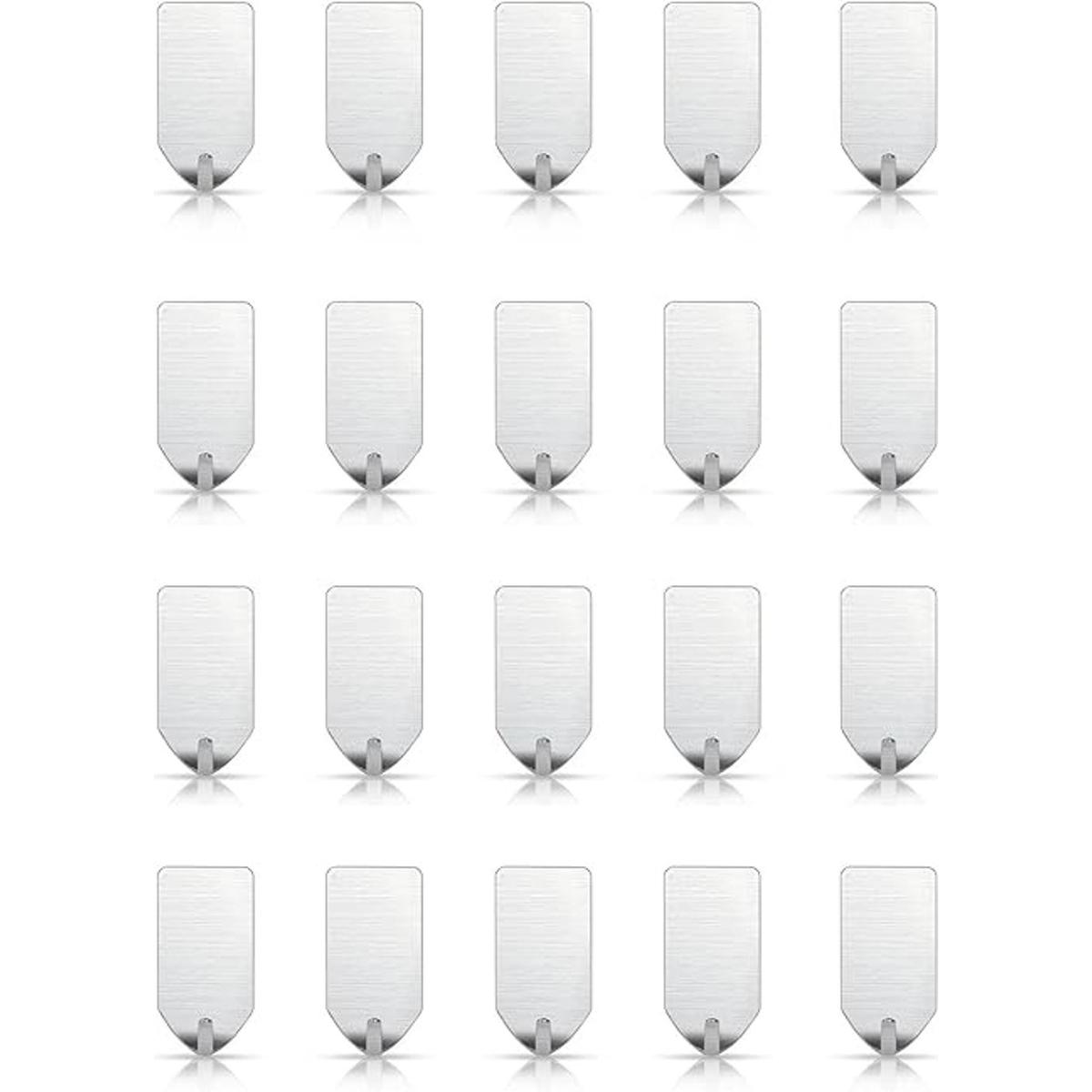 Pequeños ganchos adhesivos para utensilios de cocina