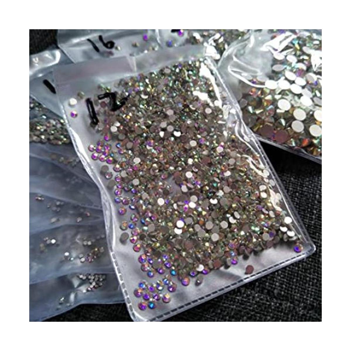 Esmalte de uñas con cristales AB redondos para manualidades.