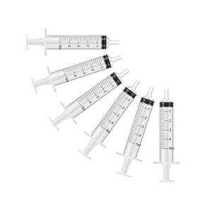 Paquete de 6 jeringas plásticas de 5 ml graduadas. Aguja_1