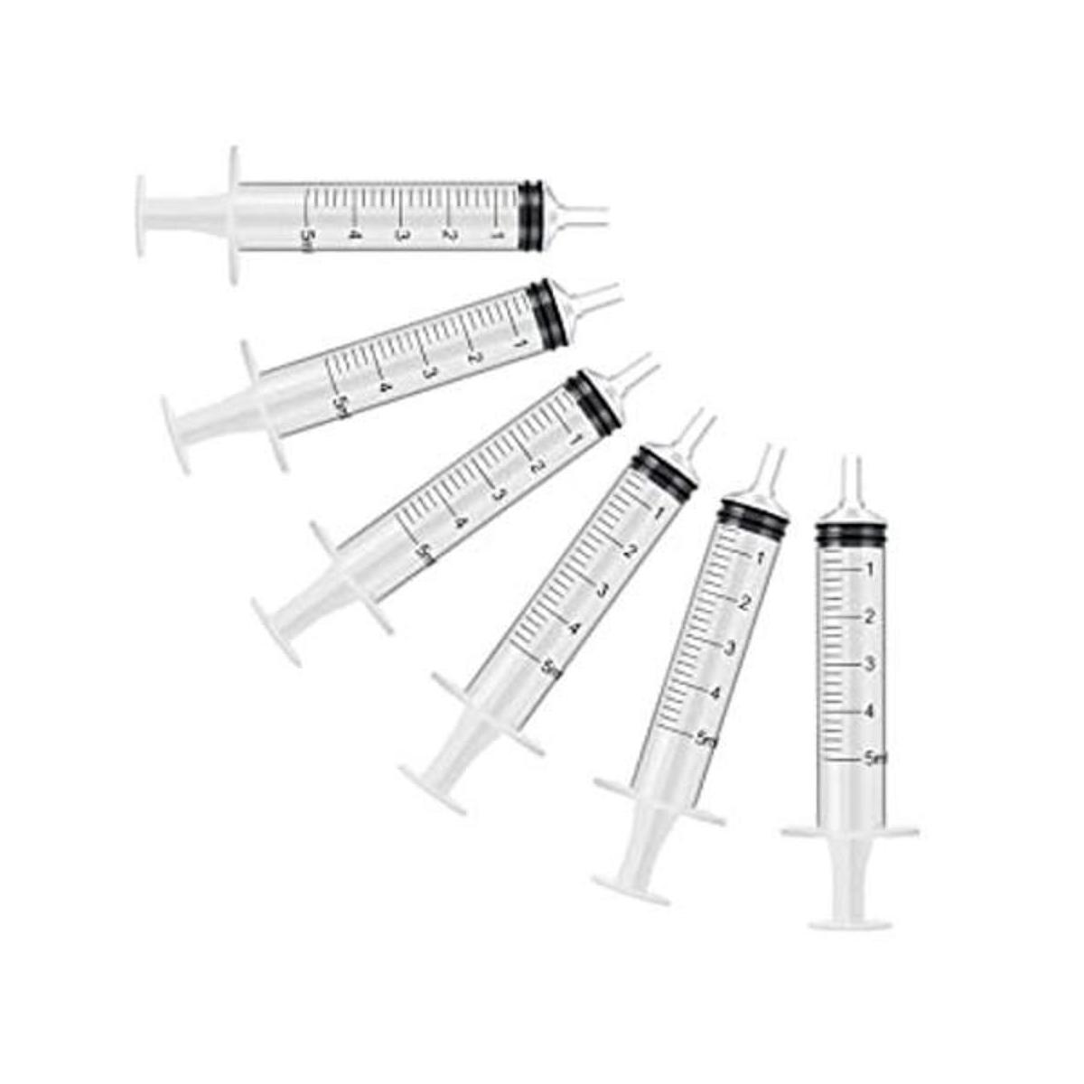 Paquete de 6 jeringas plásticas de 5 ml graduadas. Aguja