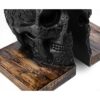 Sujetalibros de calavera góticos seres humanos de estilo