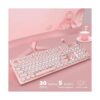 Teclado y mouse de máquina de escribir rosa teclado