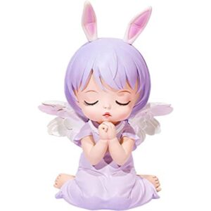 La bonita alcancía de ángel de la bendición para niñas es