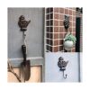 KiaoTime Ganchos de pared de hierro fundido vintage para