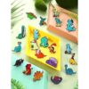 Juego de 20 broches de esmalte con diseño de dinosaurio