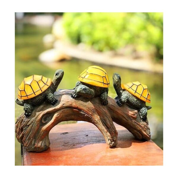 Decoración de jardín con diseño de tortugas en troncos con_2