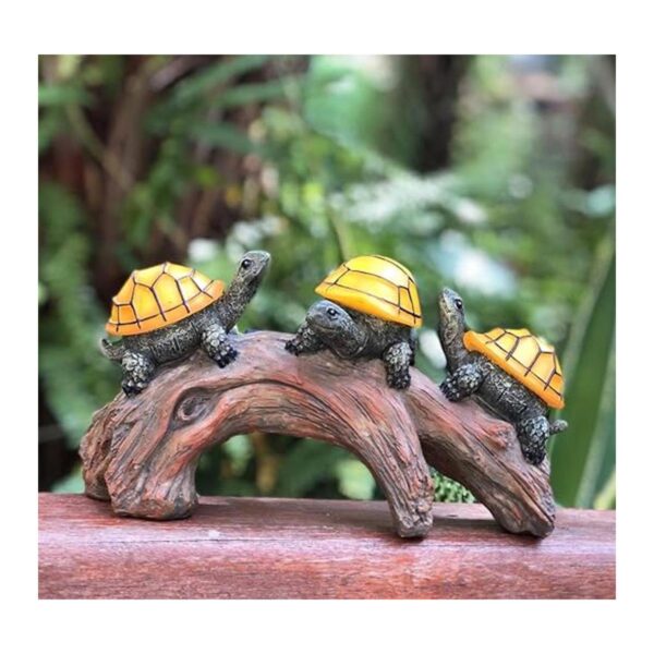 Decoración de jardín con diseño de tortugas en troncos con_3