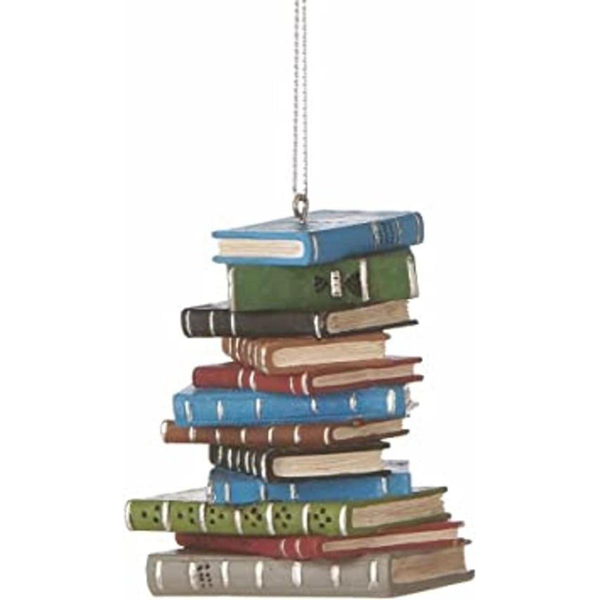 1 adorno en forma de libros apilados