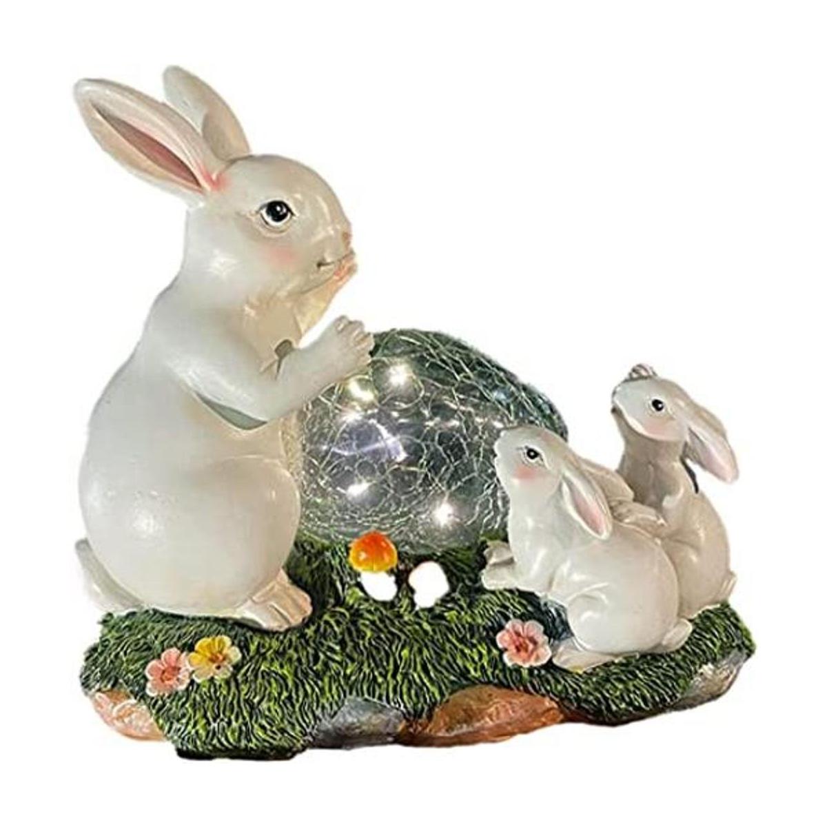 Familia de conejitos con energía solar para decoración de