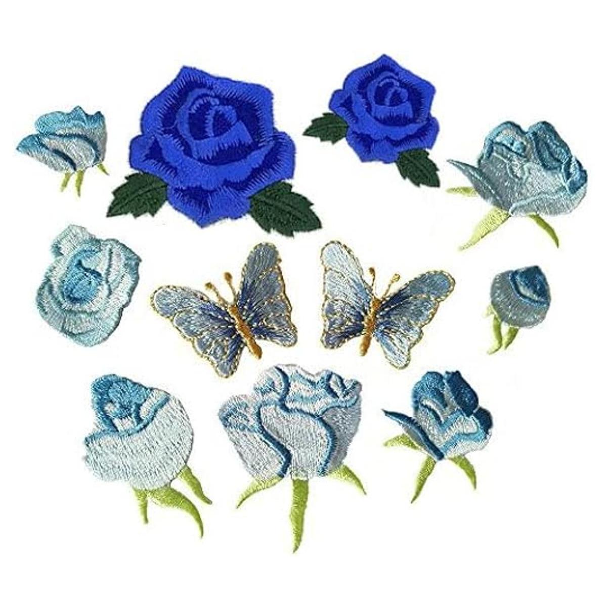 Hierro azul del bordado de la mariposa de la pequeña flor
